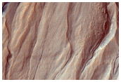 Gullies and Mantling Material