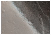 Dark Streak on Albor Tholus Caldera Wall