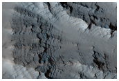 Layering along Oudemans Crater Wall