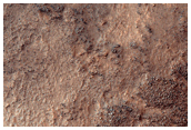 Gullies with Bright Color Deposits
