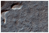 Possible Exposures of South Polar Layered Deposits