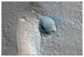 Apparent Fluvial Channel at the Summit of Hecates Tholus