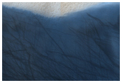 Interesting Terrain with Layered Appearance on Floor of Chasmata