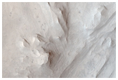 Contact between Wallrock and Light-Toned Layered Deposits in Candor Region