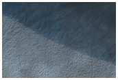 Dark-Floored Craters and Chaotic Terrain