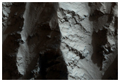 Deformed Base of Olympus Mons