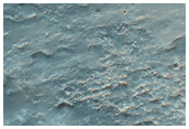 Crater Filled with Deposit in Hesperia Planum