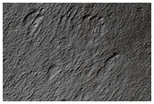 Peak of Possible Remnant Volcano in Sisyphi Planum