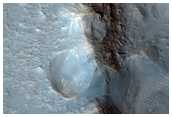Linear Intersecting Ridges in Floor of Crater Seen in MOC Image R19-00335