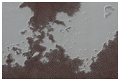 Exposure of South Polar Layers and Residual Cap Edge