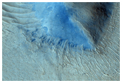 Rafted Plates in the Tartarus Colles