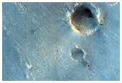 Dark Plain Near Light-Toned Layered Rock in North Sinus Meridiani