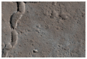 Enigmatic Channel at the Summit of Ascraeus Mons