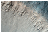 Crater in Syria Planum with Layering