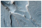 Spallanzani Crater - Swirl Patterns in Lower Layers along Northern Margin