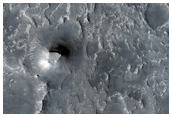 New Dark Spot Impact Crater