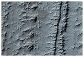 South Polar Layered Deposits Exposure with Fractures and Unconformities