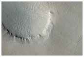 Pair of Small Pits in the Arsia Chasmata