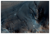 Rocky Layers and Valley Networks in Syrtis Major