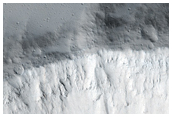 Stratigraphy in Crater within Uranius Patera Caldera