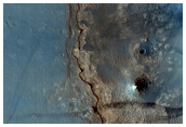 Nili Fossae - Layered Terrain Stripping to Reveal Phyllosilicates