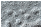 Large Shallow Crater on Edge of South Polar Layered Deposits
