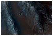 Prominent Central Peak in Hesperia Planum