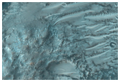 Central Peak with Layered Bedrock