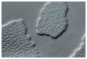 Polar Texture and Possible Remnants of Residual Cap