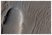 Pits and Channels on the Southern Flank of Arsia Mons
