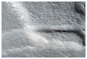 Layered Butte and Periglacial Morphologies North of Hecates Tholus