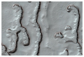 Possible Exposure of Polar Layered Deposits in Area Not Well Observed