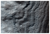 Exposure of Polar Layered Deposits in Area Poorly Observed