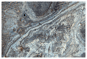 Light-Toned Layering along Plains Southwest of Melas Chasma
