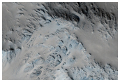 Well-Preserved Unnamed Crater Near Tartarus Region