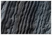 Exposure of High-Latitude Polar Layered Deposits Not Well Observed