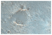 Small Crater and Mesa Northeast of Hellas Region