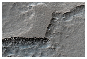 Dissected Mantle Terrain South of Hellas Region