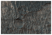 Bedrock in an Unnamed Crater Near Hellas Planitia