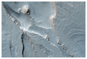 Spallanzani Crater - Swirl Patterns in Lower Layers along Northern Margin