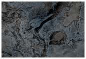 Fluvial Channels along Melas Chasma Wallrock