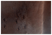 Intersection of Partially-Collapsed Valley Floor and Graben Feature