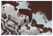 Possible Exposure of Polar Layered Deposits in Area Not Well Observed
