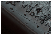 Possible Exposure of Polar Layered Deposits in Area Not Well Observed