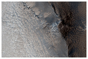 Young Fluidized Ejecta in Syria Planum
