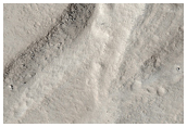 Small Features in Olympus Mons Caldera