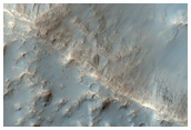Impact Crater with Lobate Eject on Fracture Systems Near Mare Sirenum