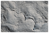 Fresh 6-Kilometer Diameter Crater Near Galaxias Mensae