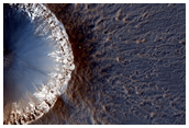 Fresh 1-Kilometer Diameter Crater in Meridiani Region