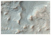 Fractured Unit Filling Crater North of Arda Valles